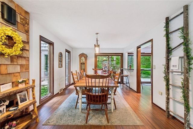 150 Buckwheat Dr, Pine Twp Nal, PA 15044 - dining area featuring dark wood finished floors and baseboards