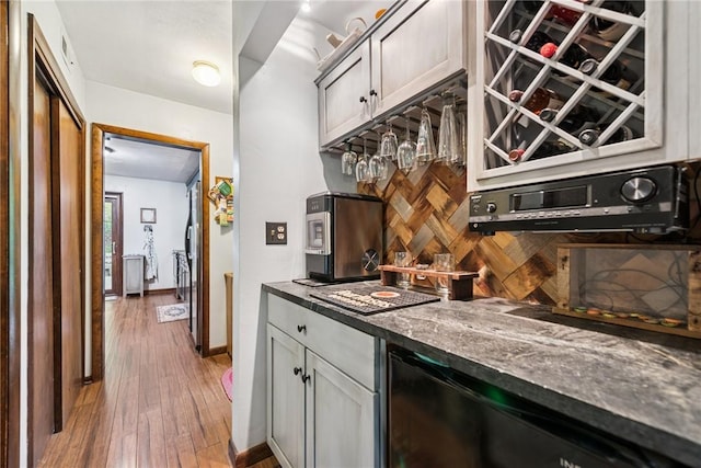 150 Buckwheat Dr, Pine Twp Nal, PA 15044 - indoor dry bar with light wood finished floors, freestanding refrigerator, dishwasher, and backsplash