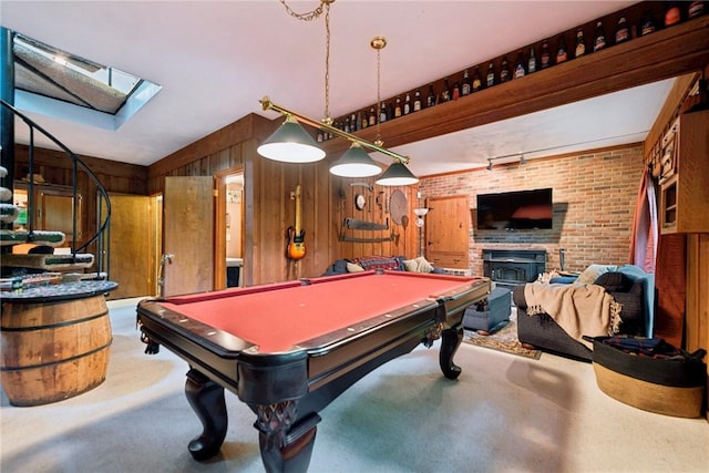 150 Buckwheat Dr, Pine Twp Nal, PA 15044 - recreation room featuring carpet floors, a skylight, wood walls, billiards table, and a fireplace