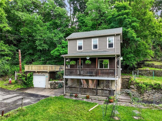 226 Herndon, Elliott, PA 15220 - view of front of home with stairway, driveway, a front yard, a garage, and a deck