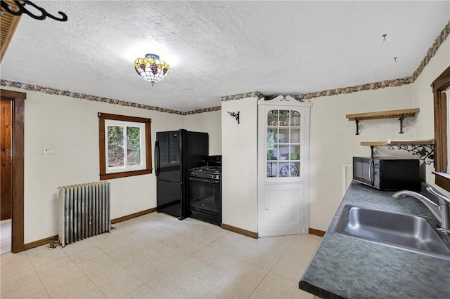 226 Herndon, Elliott, PA 15220 - kitchen with radiator, black appliances, a textured ceiling, and open shelves