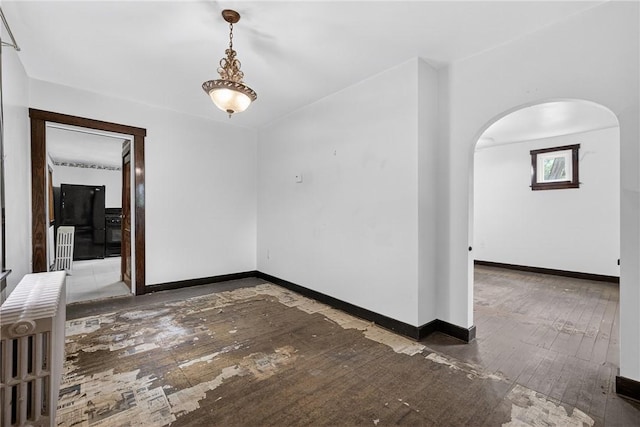 226 Herndon, Elliott, PA 15220 - empty room featuring hardwood / wood-style floors and arched walkways