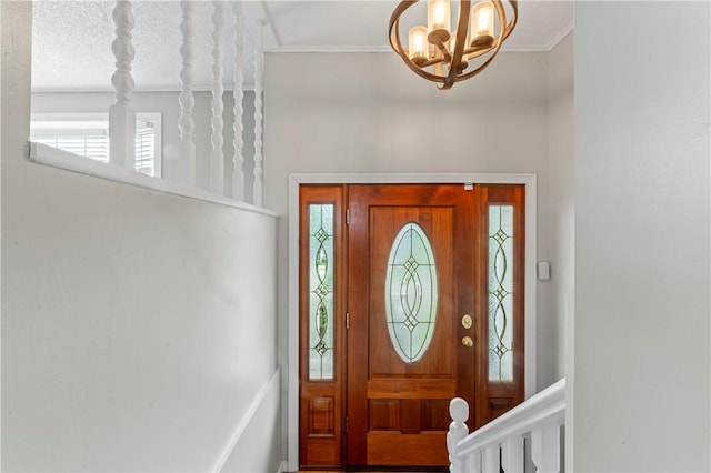 1032 Grove St, Monaca, PA 15061 - foyer entrance featuring a chandelier, plenty of natural light, and ornamental molding