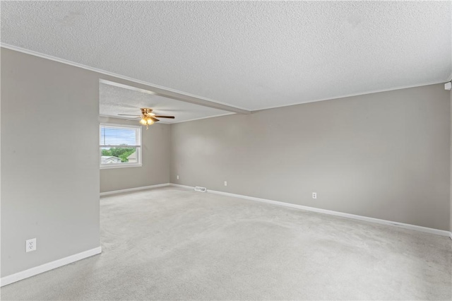 1032 Grove St, Monaca, PA 15061 - empty room with a textured ceiling, ceiling fan, light carpet, and ornamental molding