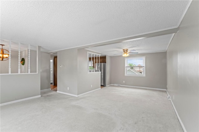 1032 Grove St, Monaca, PA 15061 - empty room with a textured ceiling, a ceiling fan, light carpet, and a chandelier
