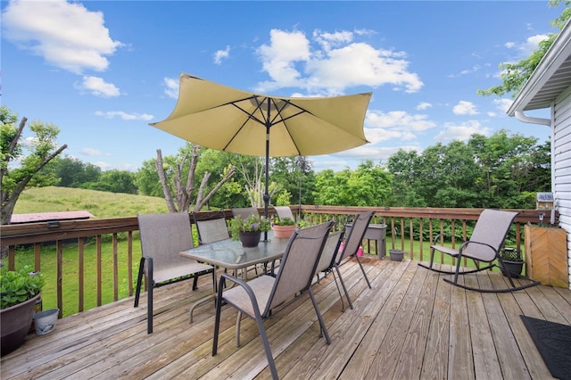 321 Dairy Farm Rd, Allegheny Twp Wml, PA 15068 - deck with outdoor dining area and a lawn