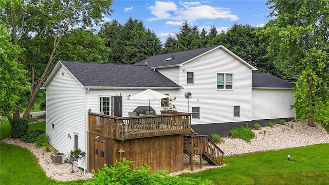 321 Dairy Farm Rd, Allegheny Twp Wml, PA 15068 - rear view of house with a shingled roof, a deck, stairs, and a yard
