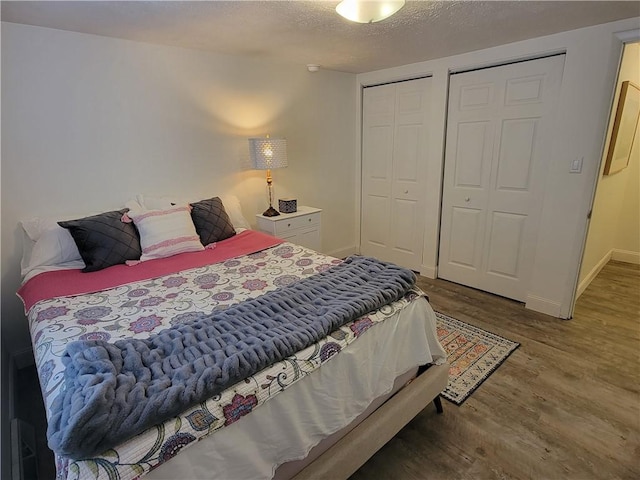 611 Broadhead Ave, Crafton, PA 15205 - bedroom with wood finished floors and a textured ceiling