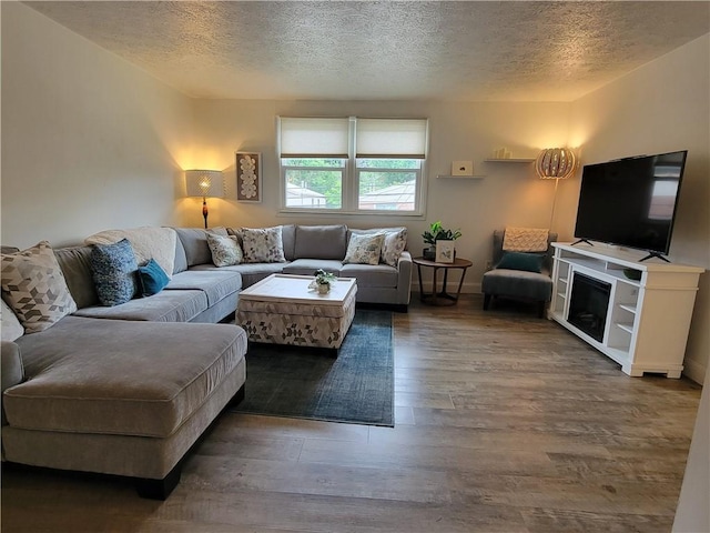 611 Broadhead Ave, Crafton, PA 15205 - living area with a textured ceiling and wood finished floors