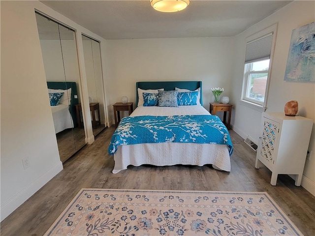 611 Broadhead Ave, Crafton, PA 15205 - bedroom featuring wood finished floors and two closets