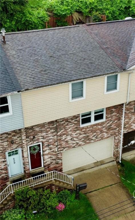 611 Broadhead Ave, Crafton, PA 15205 - view of front of property featuring a shingled roof and brick siding