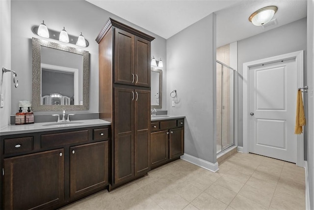 503 Tuscarora Rd, Marshall, PA 16046 - full bath with a shower stall, two vanities, and tile patterned flooring