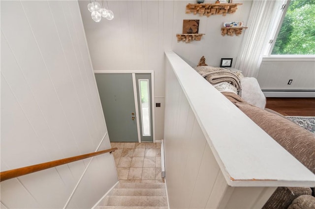 202 Village Ln, New Wilmington Boro, PA 16142 - stairs featuring a baseboard radiator