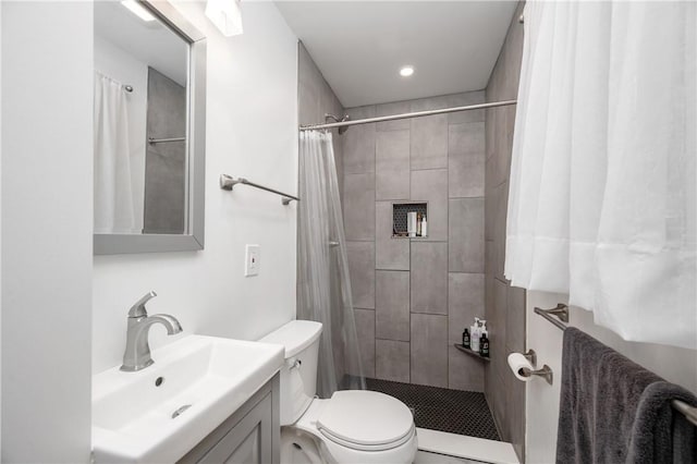 202 Village Ln, New Wilmington Boro, PA 16142 - bathroom with vanity, a tile shower, and recessed lighting