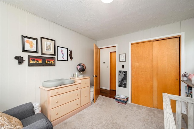 202 Village Ln, New Wilmington Boro, PA 16142 - living area featuring light colored carpet and a textured ceiling