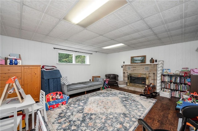 202 Village Ln, New Wilmington Boro, PA 16142 - living room with wood finished floors and a brick fireplace