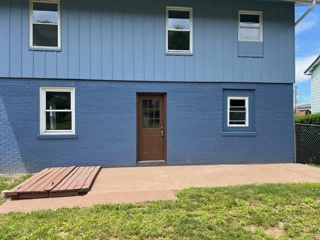 819 Forest St, Latrobe, PA 15650 - rear view of property with brick siding and a patio