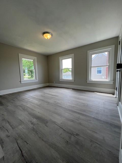 819 Forest St, Latrobe, PA 15650 - spare room featuring plenty of natural light and wood finished floors