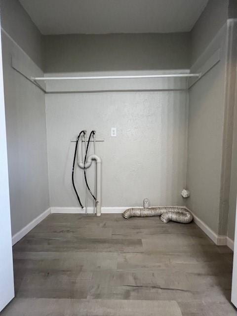 819 Forest St, Latrobe, PA 15650 - laundry area with washer hookup and wood finished floors