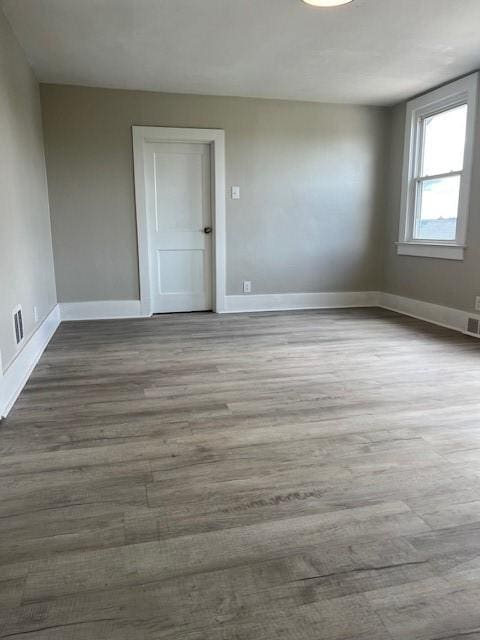 819 Forest St, Latrobe, PA 15650 - unfurnished room with wood finished floors and baseboards