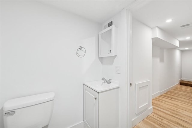 634 Euclid Ave, Canonsburg, PA 15317 - bathroom with vanity, wood finished floors, and recessed lighting