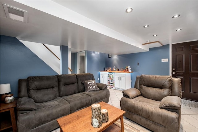 1072 N Ave, Baden, PA 15005 - living area with light tile patterned floors, bar, wine cooler, recessed lighting, and stairs