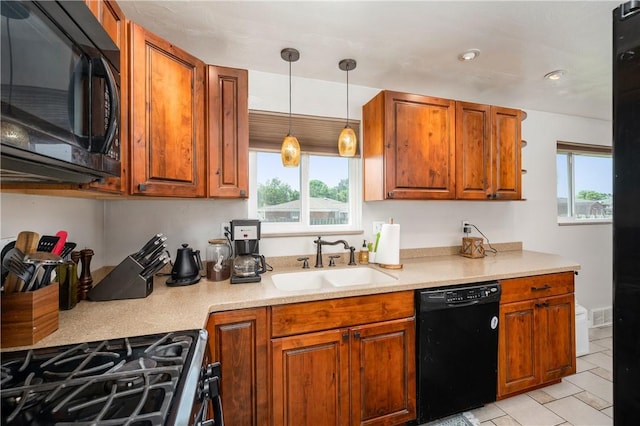 1072 N Ave, Baden, PA 15005 - kitchen with black appliances, brown cabinets, and plenty of natural light