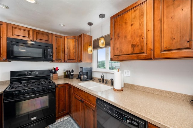1072 N Ave, Baden, PA 15005 - kitchen featuring black appliances, brown cabinets, light countertops, and hanging light fixtures