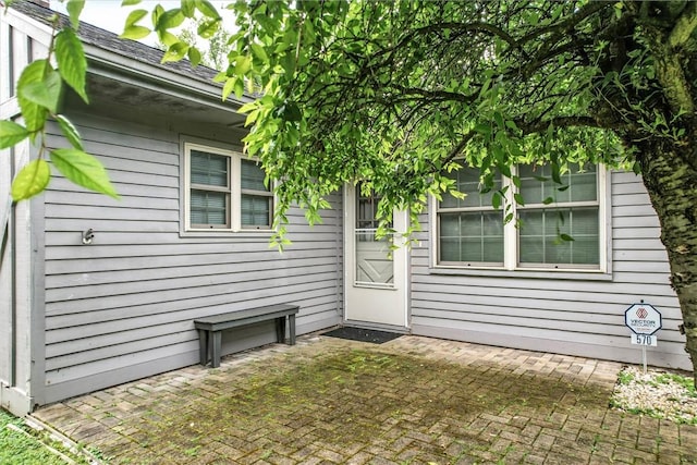 570 S 7th St, Sharpsville, PA 16150 - view of exterior entry with a patio area