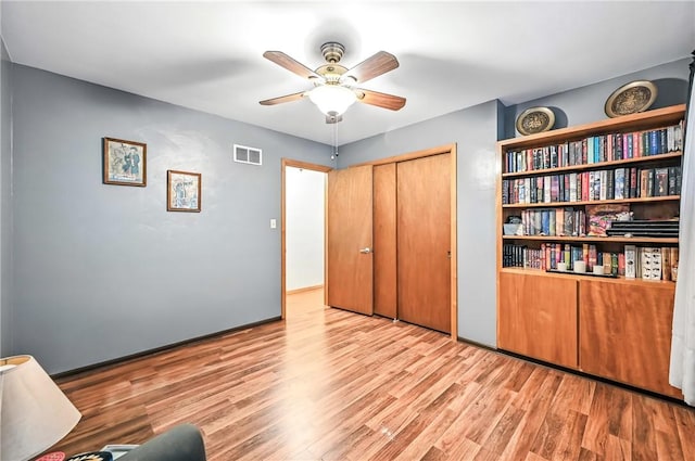 570 S 7th St, Sharpsville, PA 16150 - bedroom with light wood finished floors, a closet, and a ceiling fan