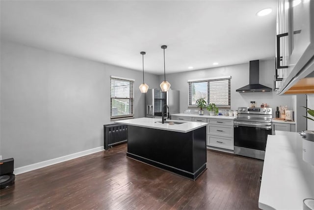 171 Clearview Ave, Ross Twp, PA 15229 - kitchen with wall chimney range hood, stainless steel electric stove, healthy amount of natural light, light countertops, and recessed lighting