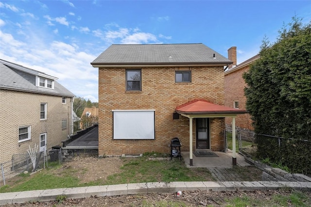 171 Clearview Ave, Ross Twp, PA 15229 - back of house with brick siding, a patio, and a fenced backyard