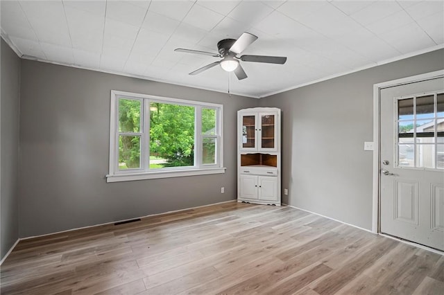 1204 Griswold St, Sharon, PA 16146 - empty room featuring ceiling fan, wood finished floors, and ornamental molding