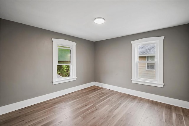 1204 Griswold St, Sharon, PA 16146 - empty room featuring baseboards and wood finished floors