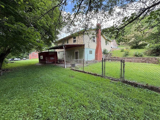 717 King St, Mckeesport, PA 15132 - rear view of house featuring a gate and a chimney