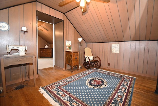 1673 Elderslee Rd, Baldwin Boro, PA 15227 - sitting room featuring lofted ceiling, wood finished floors, ceiling fan, and wood walls