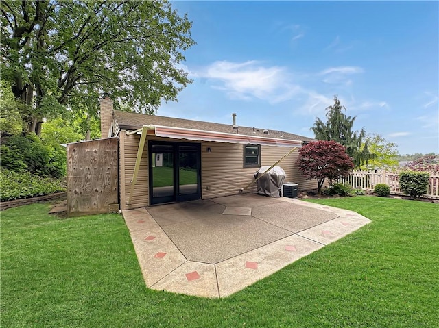 321 Jo Ann Dr, West Mifflin, PA 15122 - back of house with a patio and a chimney