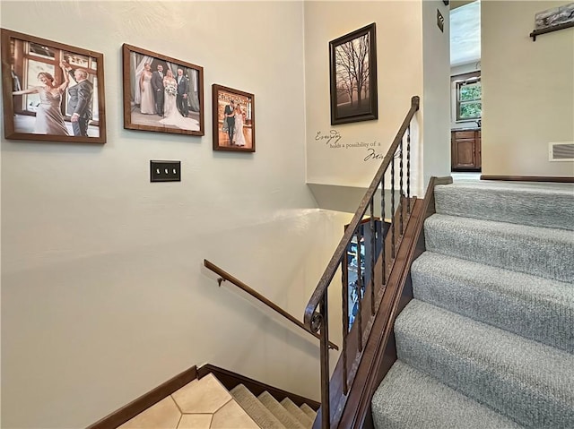 321 Jo Ann Dr, West Mifflin, PA 15122 - staircase with baseboards and tile patterned flooring