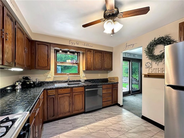 321 Jo Ann Dr, West Mifflin, PA 15122 - kitchen featuring appliances with stainless steel finishes, light marble finish floors, and a ceiling fan