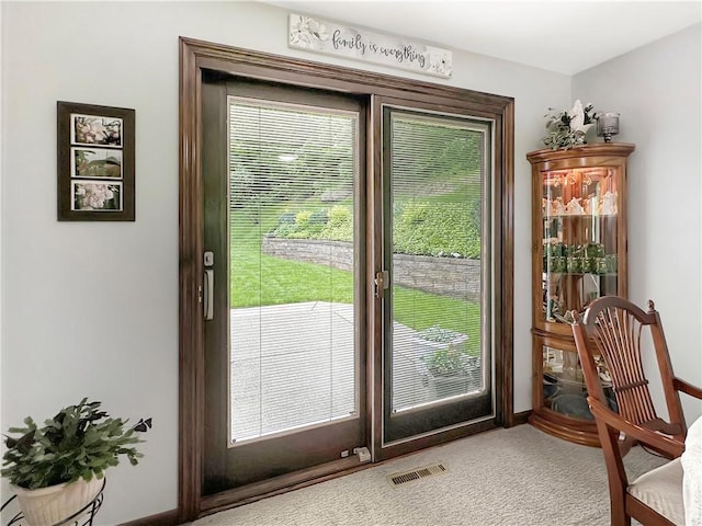 321 Jo Ann Dr, West Mifflin, PA 15122 - entryway featuring healthy amount of natural light and carpet floors