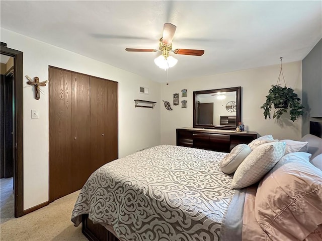 321 Jo Ann Dr, West Mifflin, PA 15122 - bedroom with light carpet, a closet, and ceiling fan