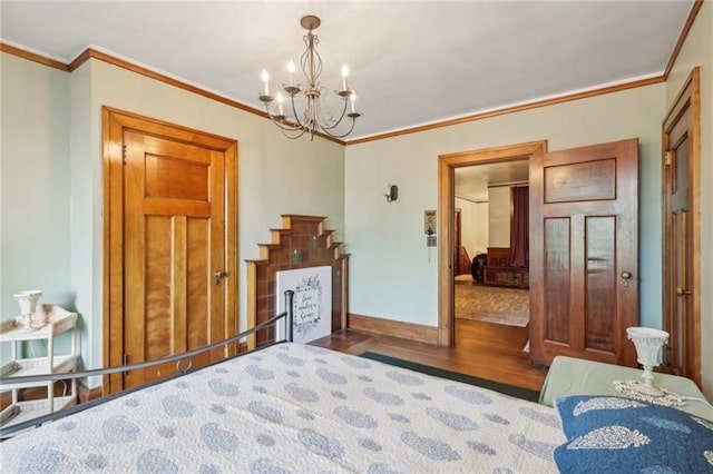 221 E Moody Ave, New Castle/2Nd, PA 16101 - bedroom with wood finished floors, crown molding, and a chandelier