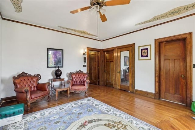 221 E Moody Ave, New Castle/2Nd, PA 16101 - living area with ceiling fan, wood finished floors, and ornamental molding