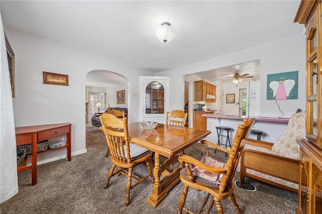 3176 Churchview Ave, Baldwin Boro, PA 15227 - dining room featuring arched walkways, carpet floors, and a ceiling fan
