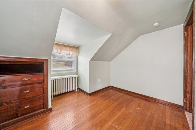 3176 Churchview Ave, Baldwin Boro, PA 15227 - additional living space with radiator, lofted ceiling, and hardwood / wood-style floors