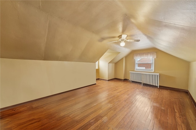3176 Churchview Ave, Baldwin Boro, PA 15227 - bonus room with radiator heating unit, hardwood / wood-style floors, lofted ceiling, and a ceiling fan