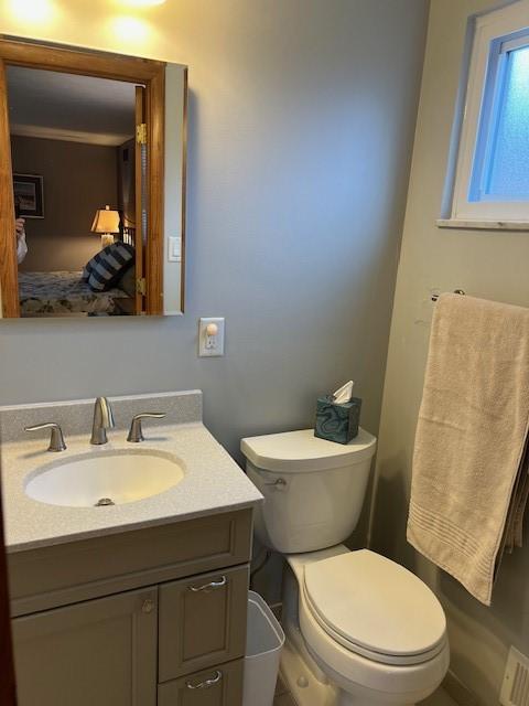 77 Ridgecrest Dr, Wilkins Twp, PA 15235 - half bathroom with toilet and vanity