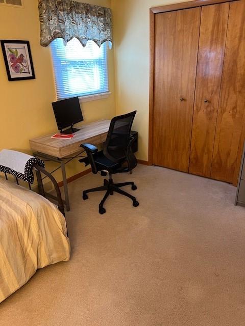 77 Ridgecrest Dr, Wilkins Twp, PA 15235 - bedroom with light colored carpet and a desk