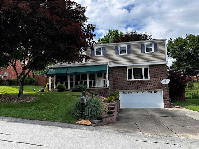 77 Ridgecrest Dr, Wilkins Twp, PA 15235 - view of front of house with a garage, brick siding, concrete driveway, and a front lawn