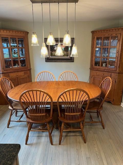 77 Ridgecrest Dr, Wilkins Twp, PA 15235 - dining room featuring light wood-style floors
